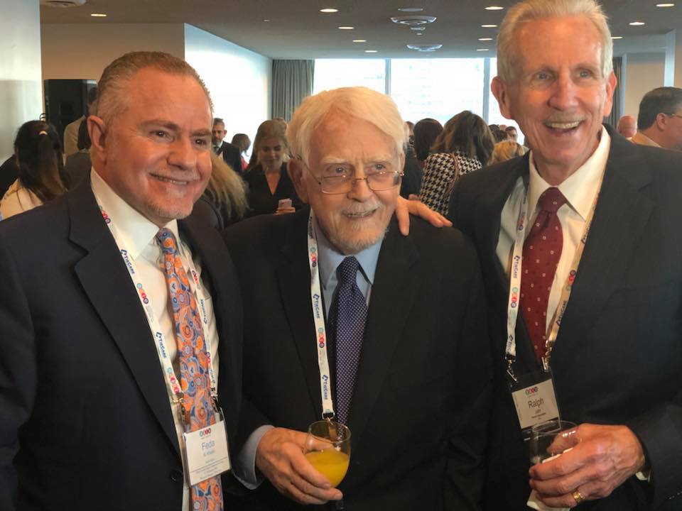 Founder John Magagna (middle) and Ralph Jahr (right) strike a smile during the Welcome Reception