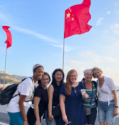 With diverse colleagues on a trip in China