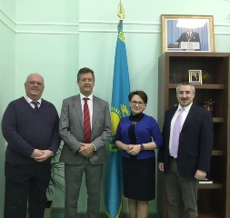 At Miras International School, Astana. From left: Stephen Butlin, Secondary Principal; Senior Associate Bill Turner; Yelena Khamitova, Head of School; and Jared Tabita, Primary Principal