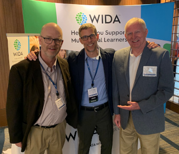 Jon (center) with Exec. Directors Tim Boals of WIDA (L) and Tom Ulmet of ACAMIS (R)