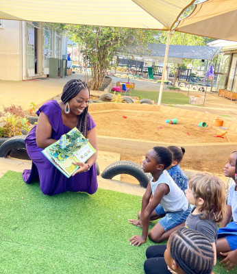 Jeannette reading to Grade 1 students at WIS