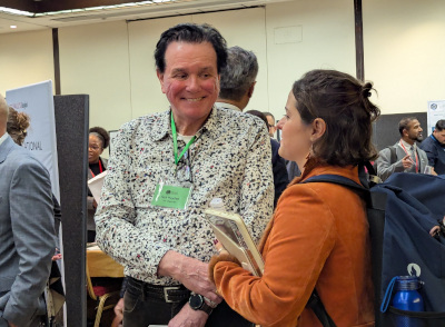 Fair host Gez Hayden greets a candidate