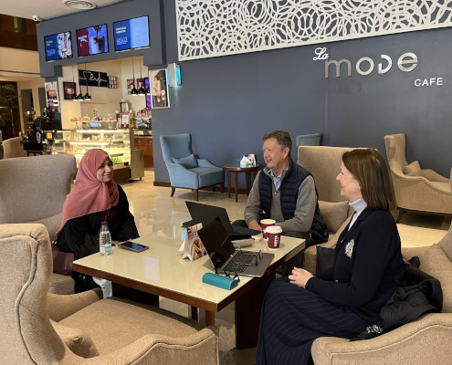 Bill and Alison Turner (R) chat with a teacher